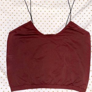 Red crop top with black straps